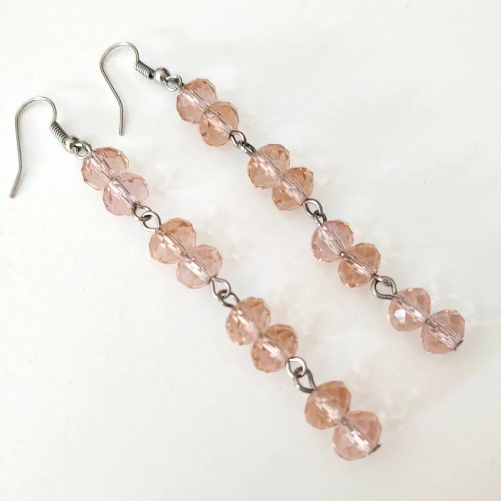 Faceted pink glass dangle earrings